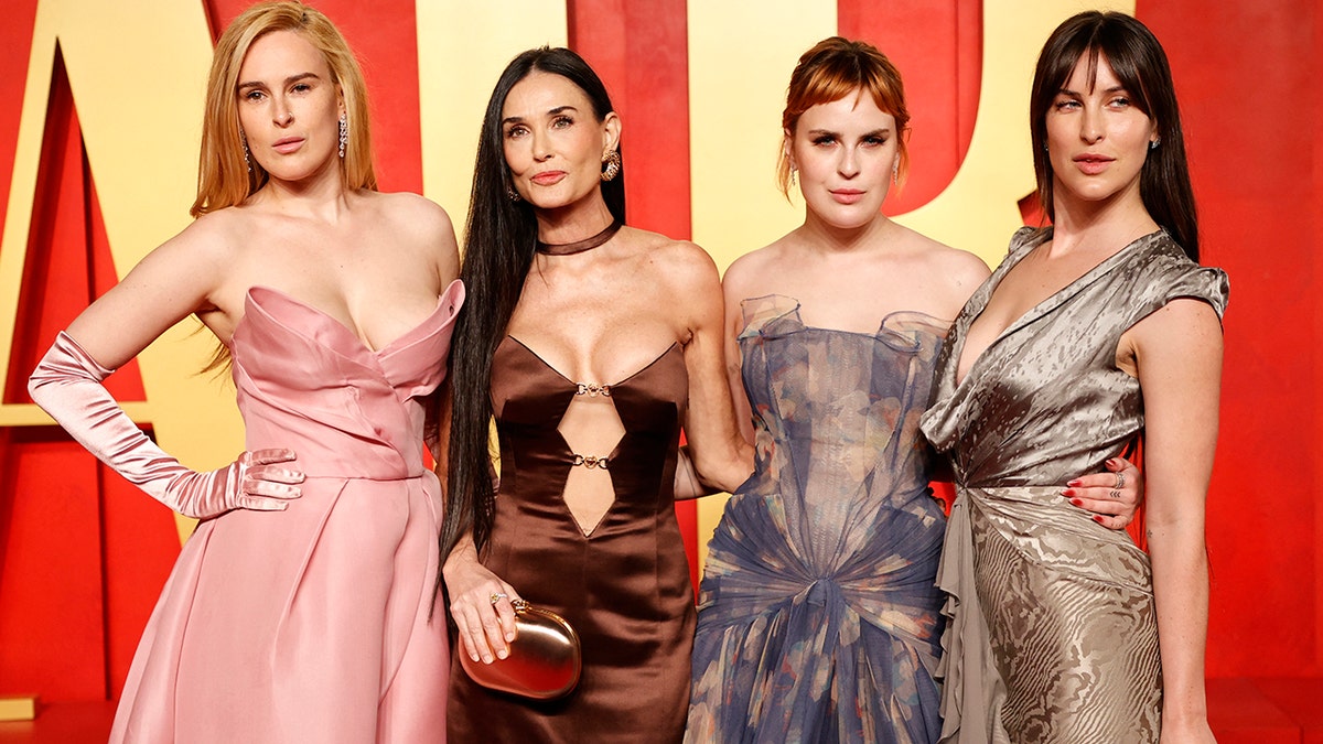 Demi Moore with her daughters at the Vanity Fair oscars party