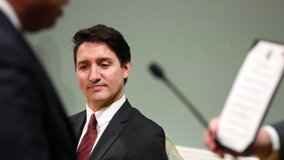 Justin Trudeau wearing a suit and tie