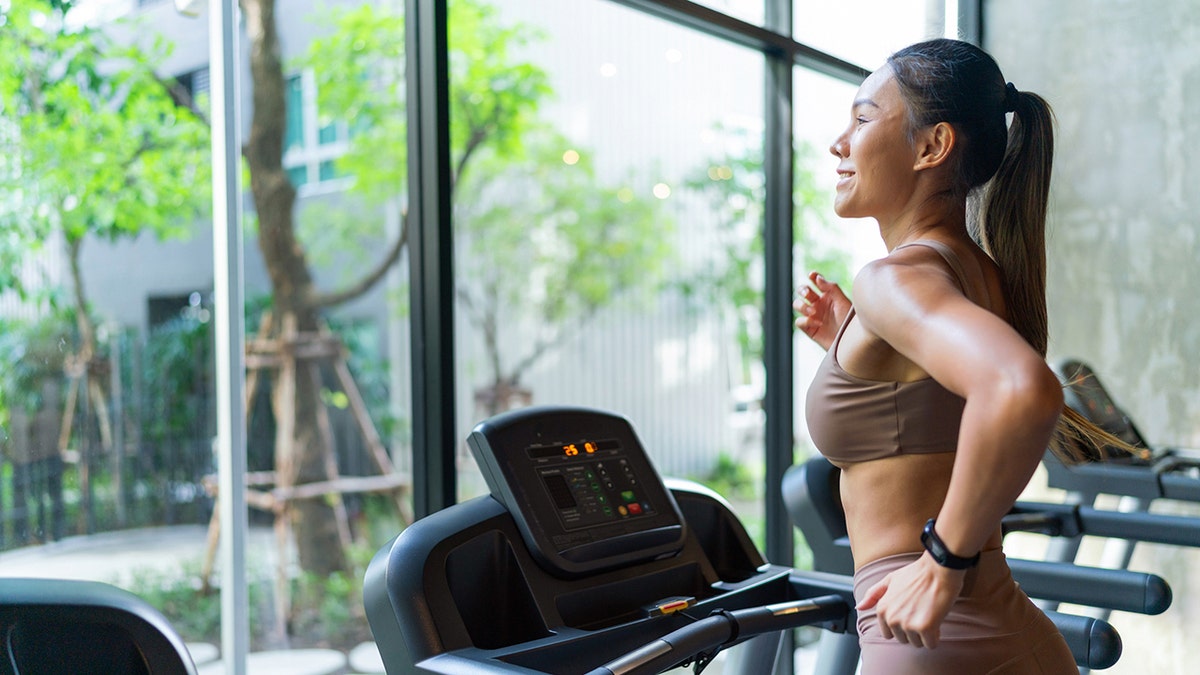 Woman walking on treadmill