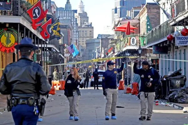 Law enforcement officers from multiple agencies work the scene on Bourbon Street after a person drove into the crowd in New Orleans, in the early morning hours of New Year's Day, on Jan. 1, 2025. (Michael DeMocker/Getty Images)