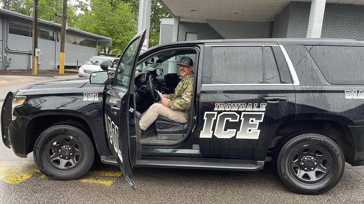 Lt. Mark Meadows inside Irondale police cruiser