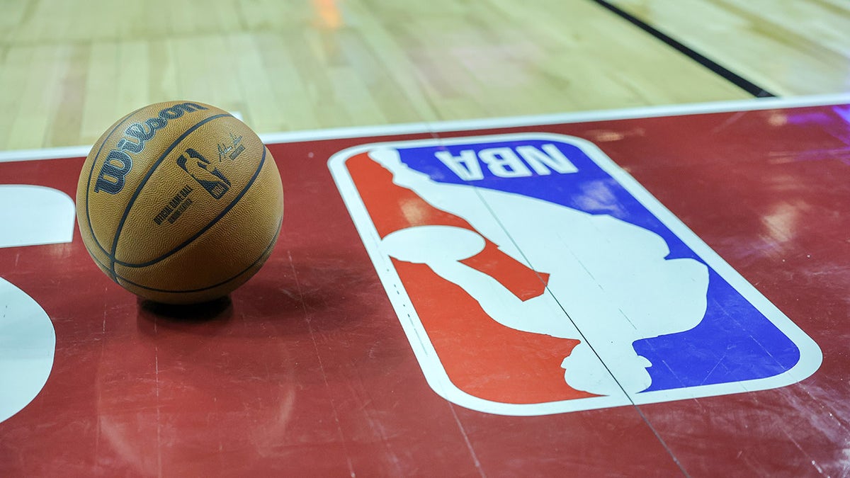 NBA logo on a basketball court