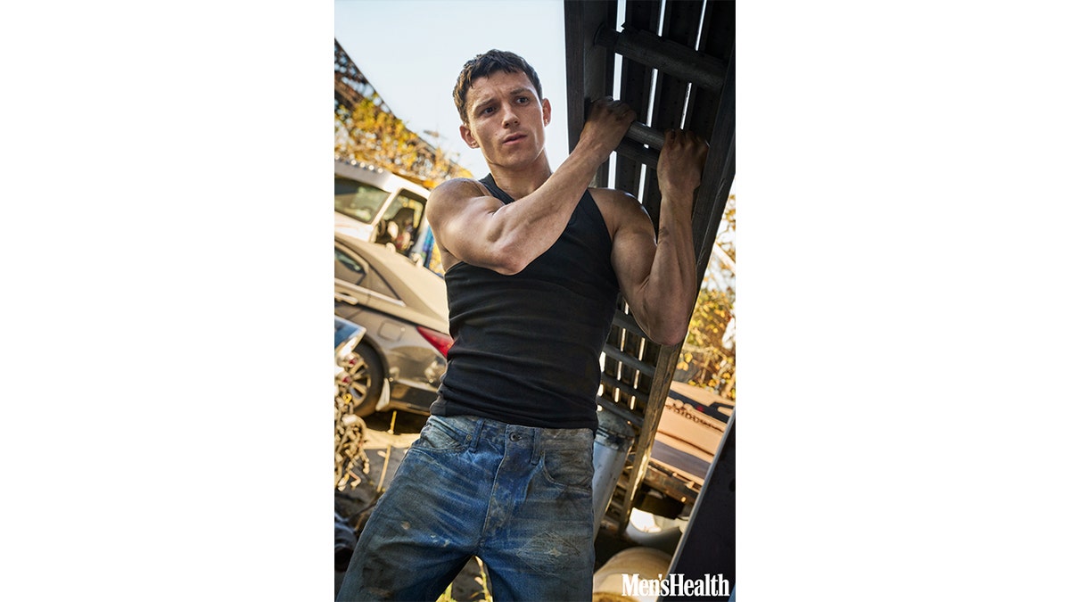 Tom Holland poses for a magazine